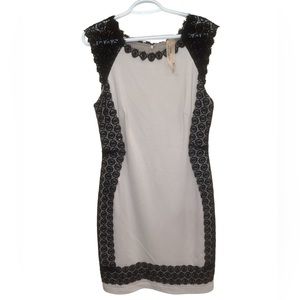 Cream dress with black laced crochet detail on sides size L